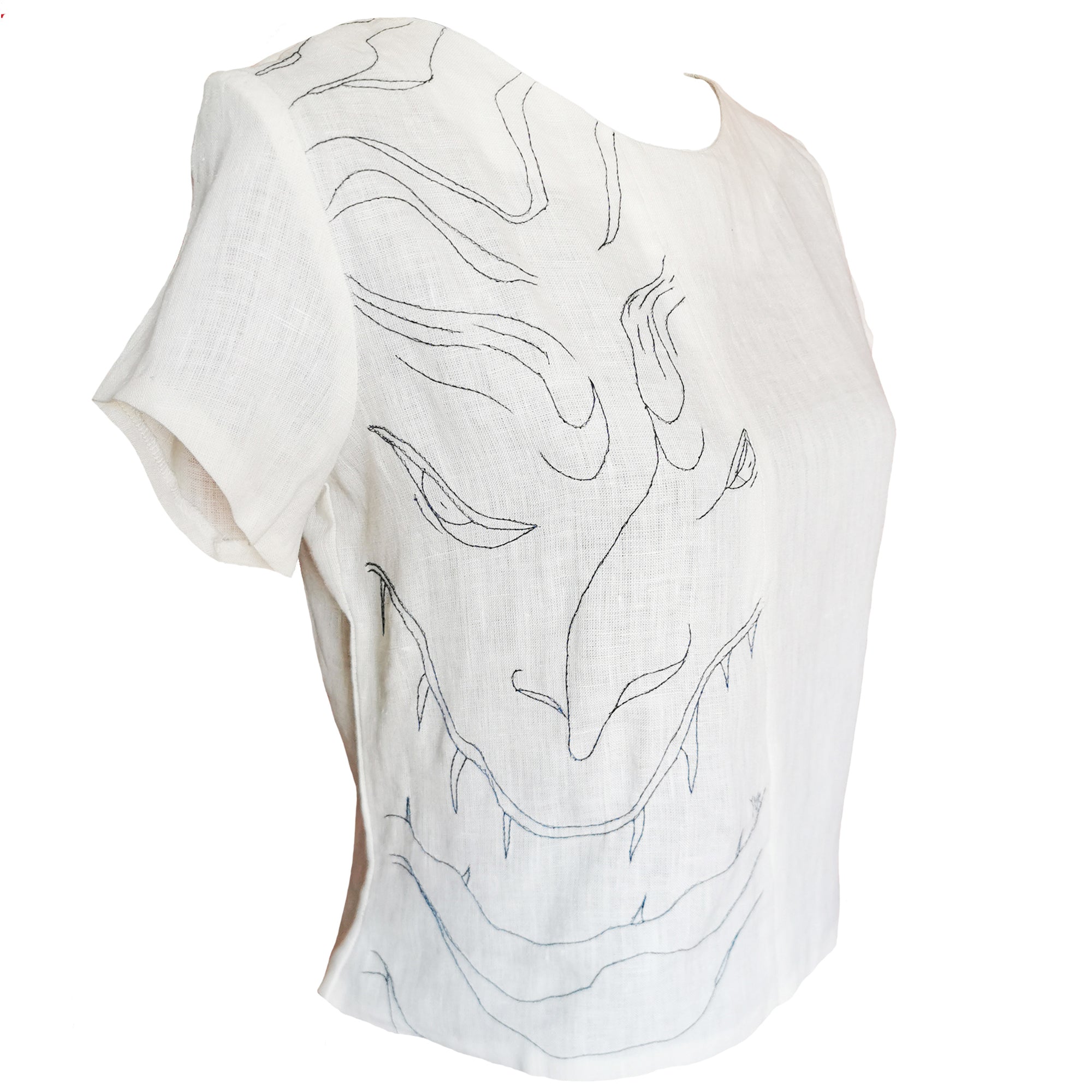 Top de lino cuello redondo bordado